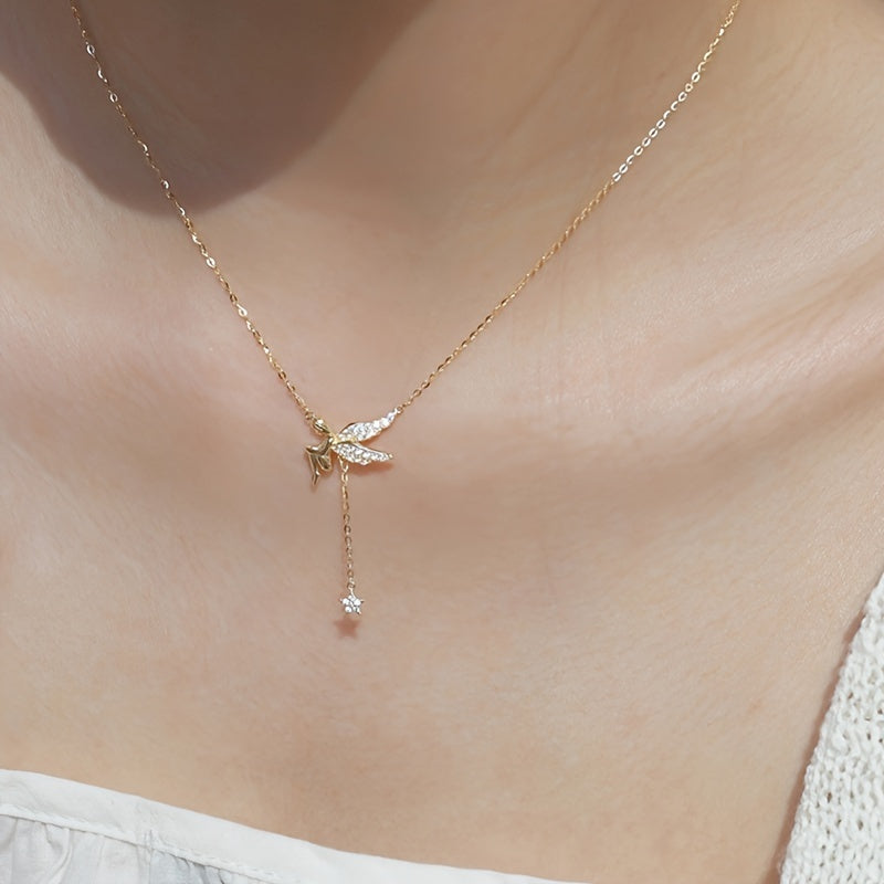 Sterling silver necklace with elf design, featuring a tassel and star pendant. This fashionable and minimalist clavicle chain is perfect for women who appreciate elegant French style. Inspired by celestial symbols, this piece adds a touch of charm to any