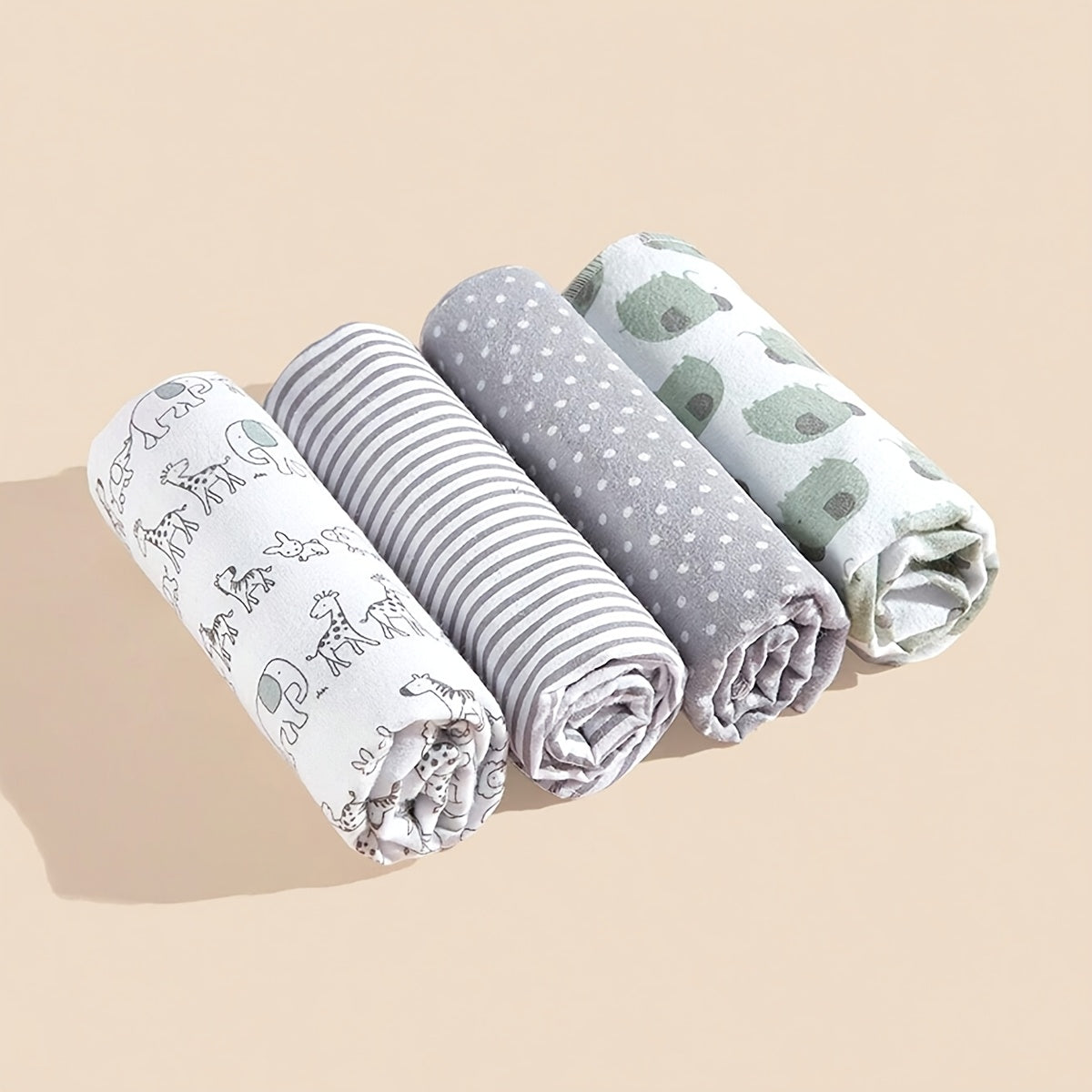 Machine washable set of 4 soft flannel swaddle blankets, ideal for youngsters and nursery necessities.