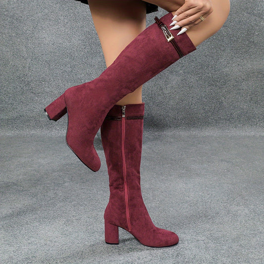 Burgundy side zip round toe knee-high boots with chunky heels.