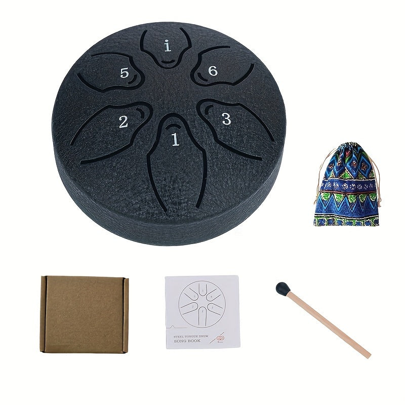 Mini steel tongue drum set with 6 notes, mallets, music book, case, and accessories.