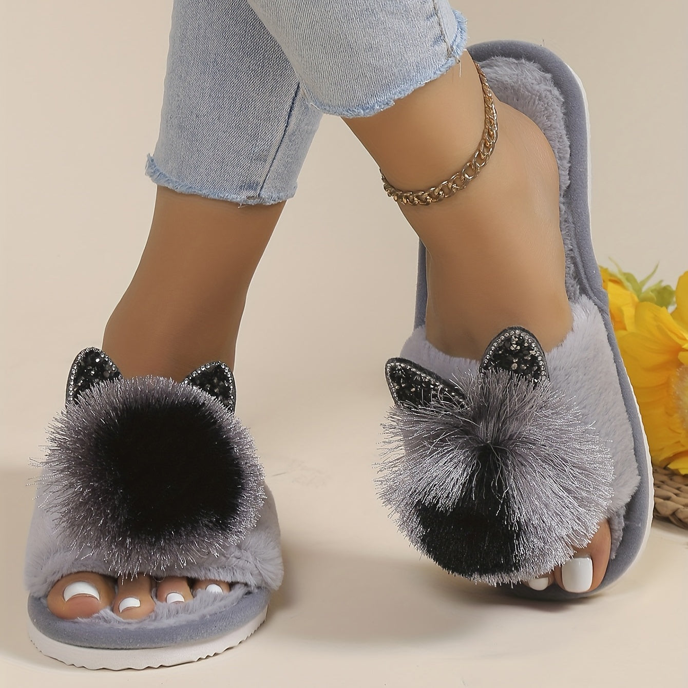 Adorable gray bow slippers with fluffy black accents, EVA sole, all-season comfort, and machine washable