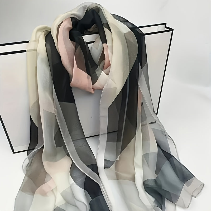 One elegant polyester scarf for women with geometric print, suitable for all seasons and occasions, machine washable.