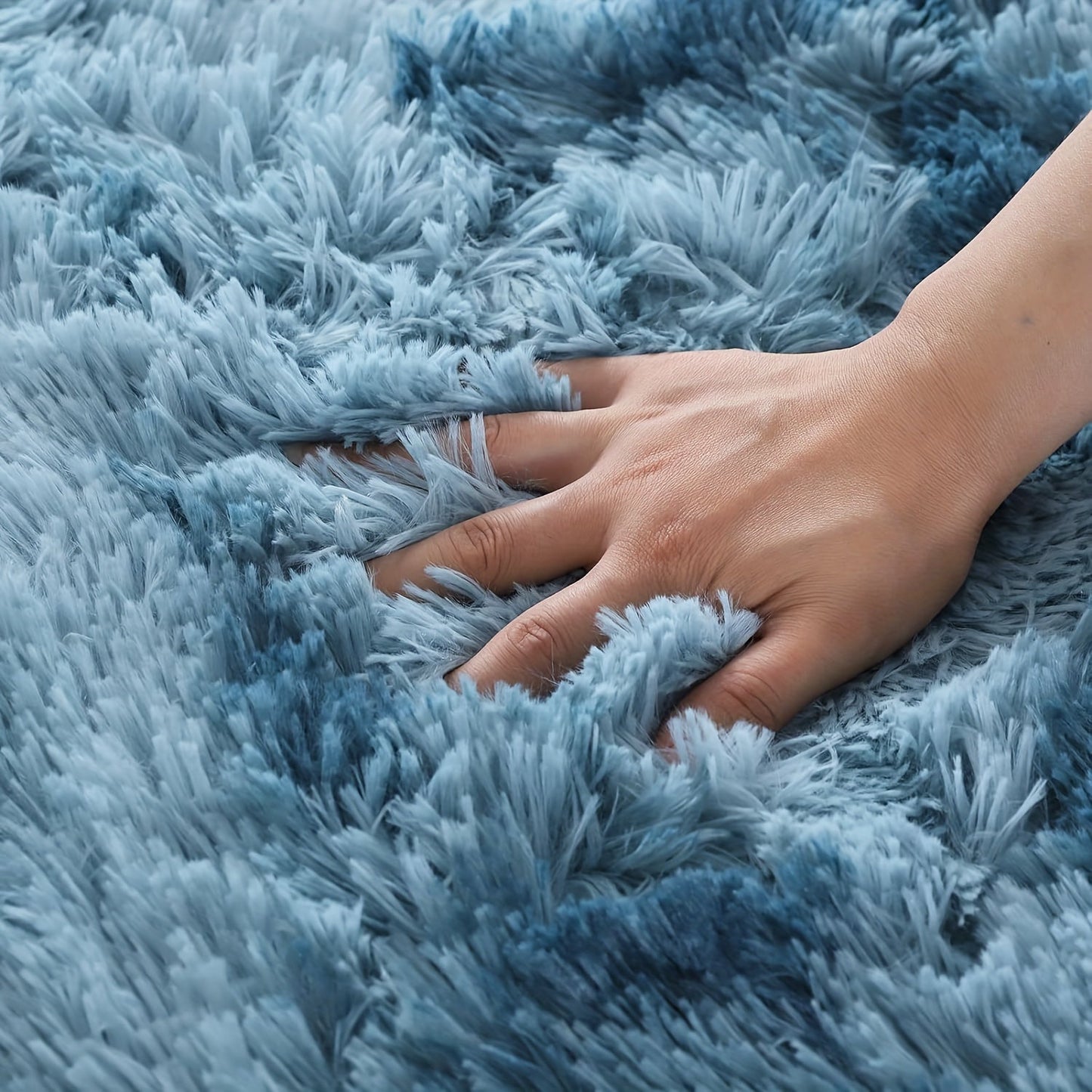 Indulge in comfort and style with this plush faux fur area rug, perfect for your living room or bedroom. Made from soft polyester, this fluffy carpet is non-slip and easy to care for with dry cleaning. Add a touch of luxury to your home decor with this