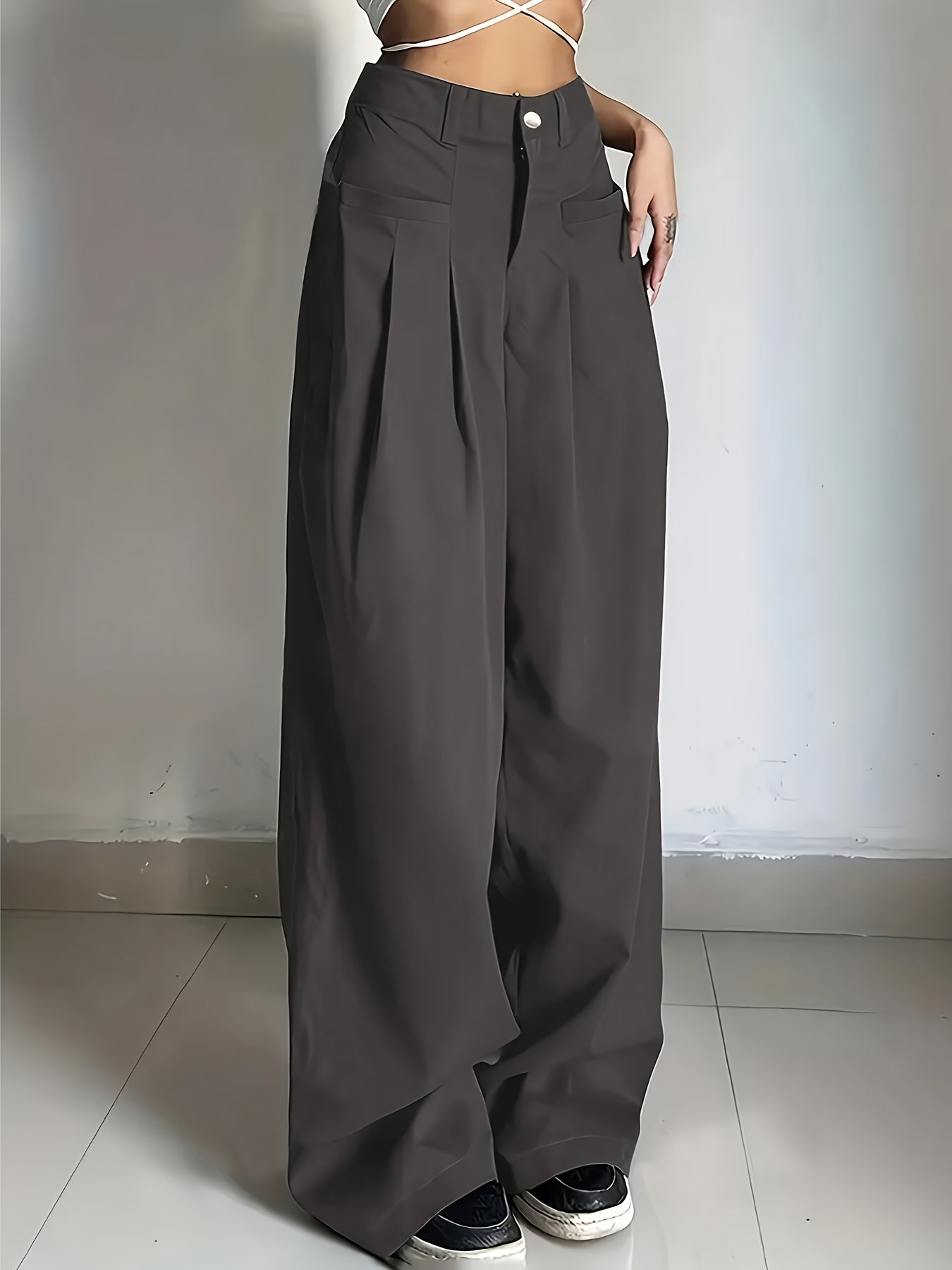 High-waisted button-front work pants in solid colors for women's office attire.