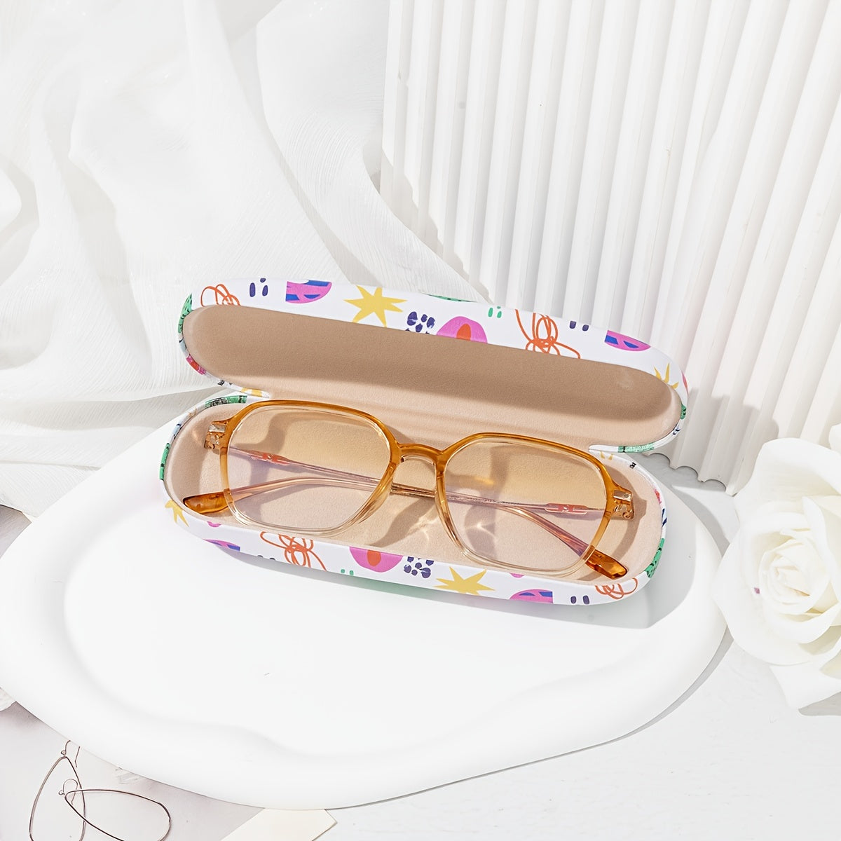 Protective storage box for glasses and sunglasses featuring colorful printed designs and fun patterns, designed specifically for ladies. The hard shell case ensures your eyewear stays safe and stylish.