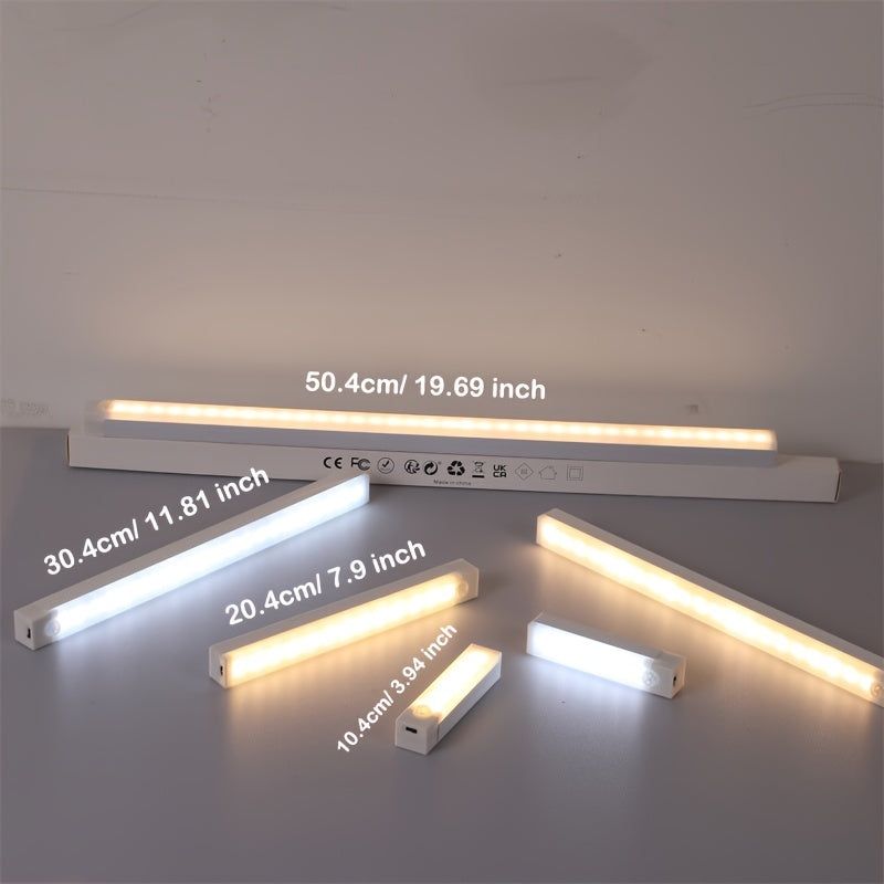 Wireless magnetic LED light strip for wardrobe and kitchen with rechargeable battery and adhesive backing for easy installation in closets, cupboards, stairs, and hallway shelves.