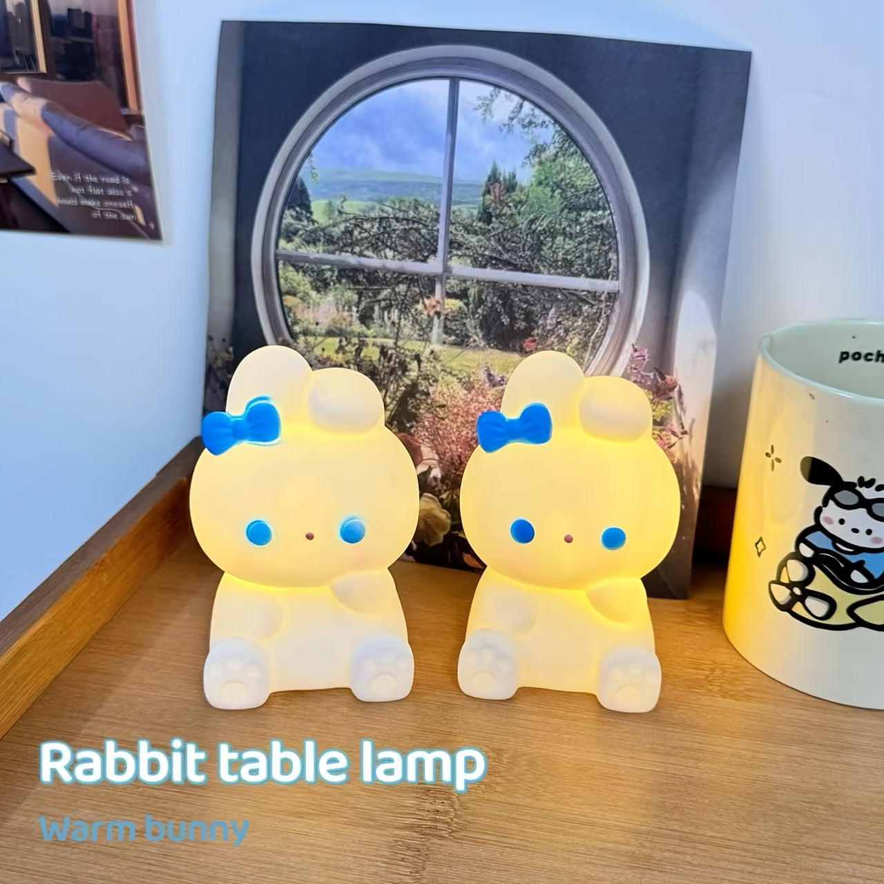 Asian style plastic table lamp in the shape of a rabbit with a bow, battery powered and controlled by toggle switch. Soft lighting for home decor, suitable for different rooms. Great for gifting on Christmas and birthdays.