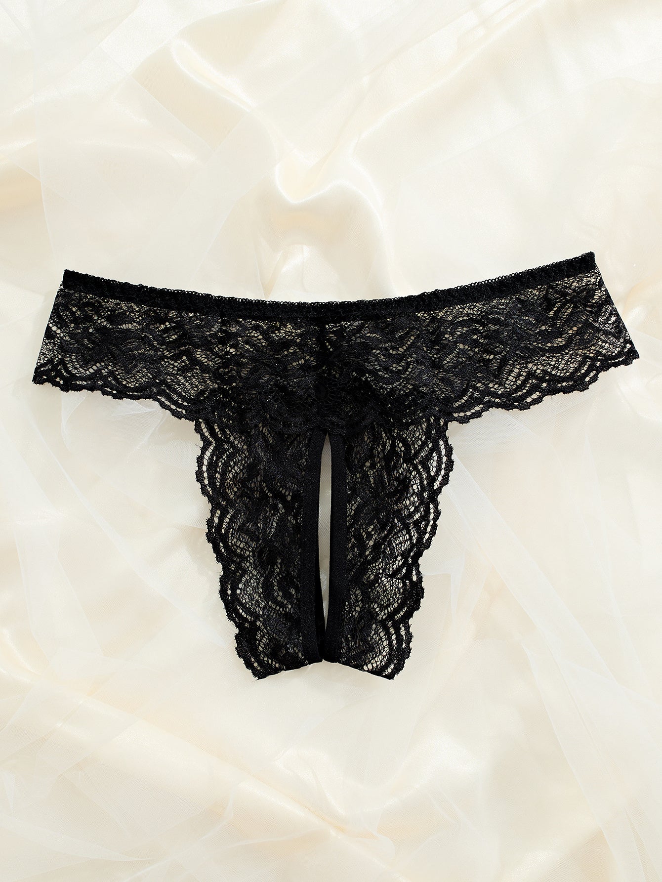 Sexy black lace panties with open crotch, low-rise design, perfect for Valentine’s Day.