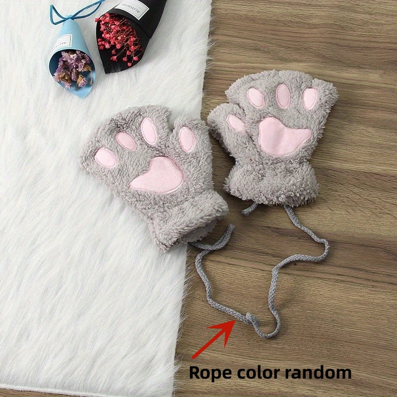 Soft and thickened half-finger winter gloves featuring cute cartoon cat paw design, ideal for keeping your hands warm and cozy. These touchscreen gloves are perfect for adding a touch of fun to your winter wardrobe.