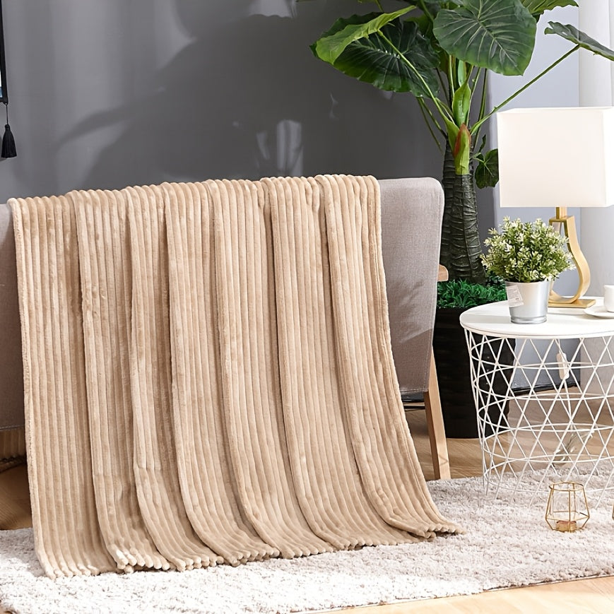 Stay cozy with our Contemporary White Flannel Fleece Blanket, featuring a thick striped coral fleece design. Perfect for the office, yoga, or sofa, this all-season multipurpose knitted polyester throw is machine washable and weighs 250-300gsm.