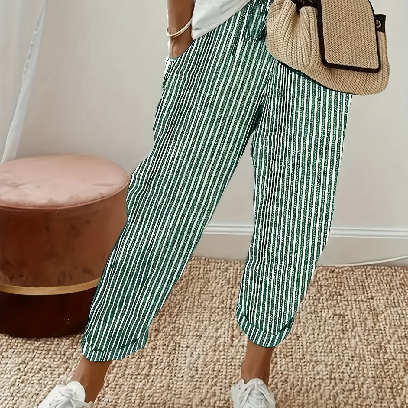 High-waisted, striped wide-leg pants for women made of lightweight polyester. Machine washable with side stripe detail for all-season comfort.