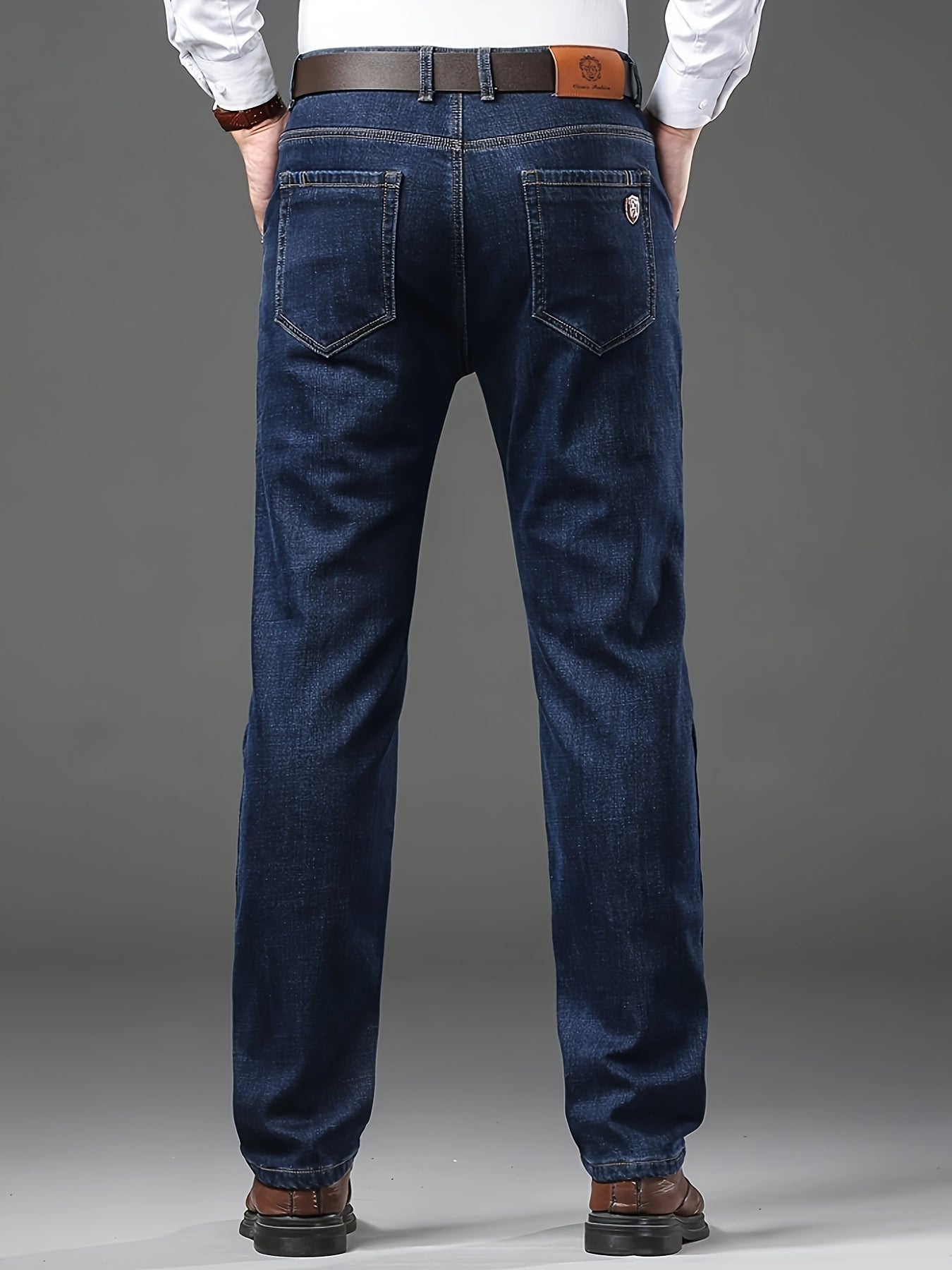 Men's Classic Straight Fit Jeans made of 61.6% Cotton, 36.9% Polyester, and 1.5% Elastane with Regular Length. The jeans have a slight stretch, weigh 260g/m², come in a solid color, are