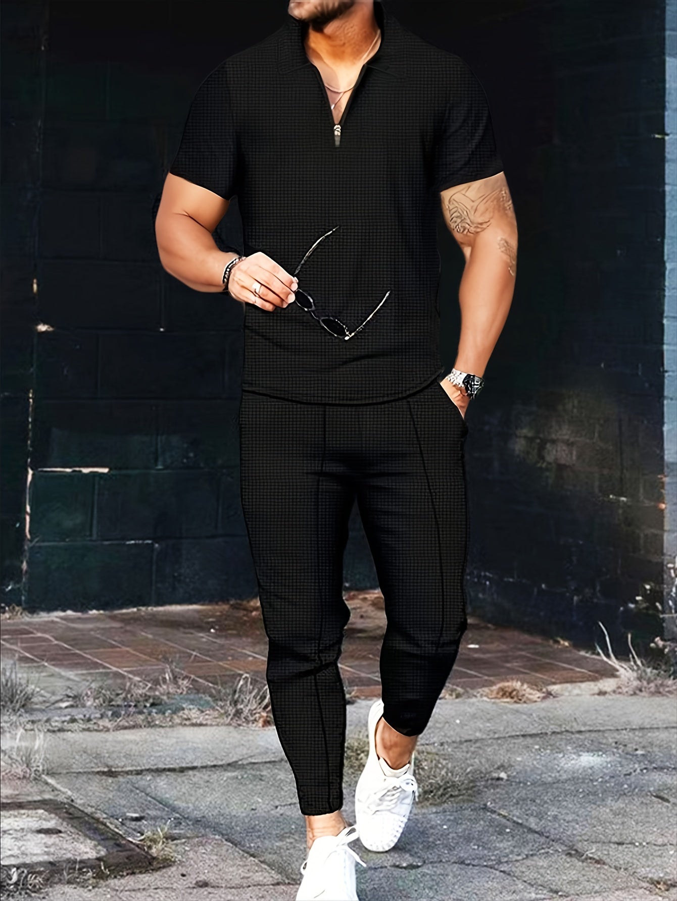 Men's two-piece set featuring short sleeve waffle knit top with turnover collar and zipper, paired with long pants.