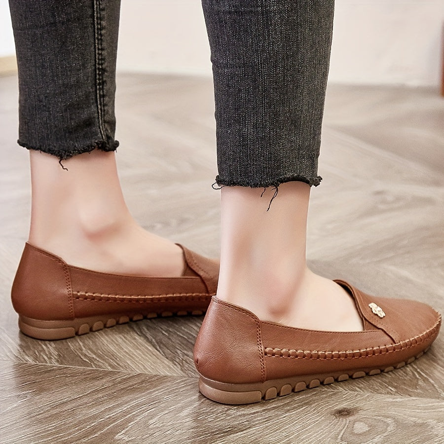 Stylish, comfortable women's loafers with flower buckle detail and soft sole for daily wear.