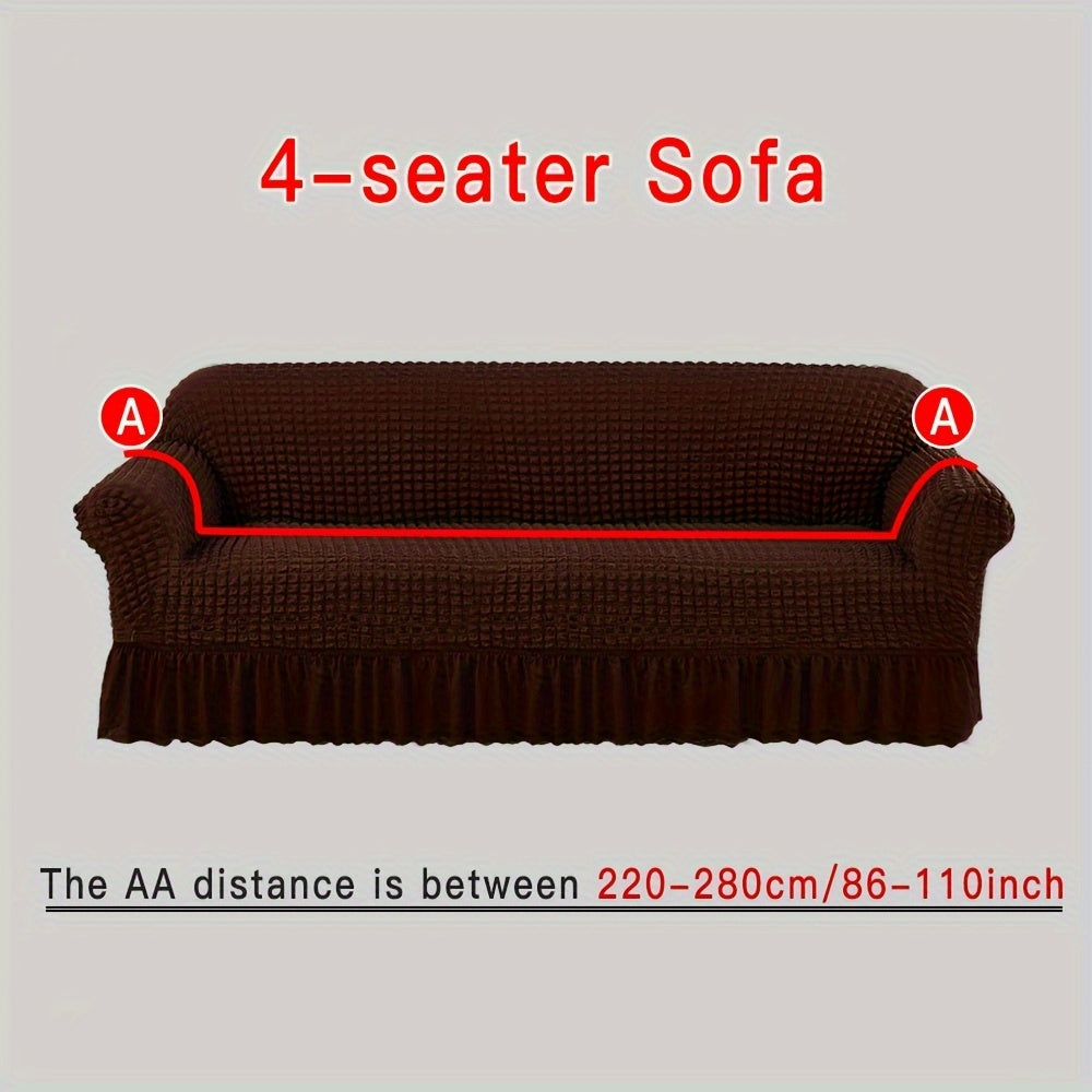 Stylish beige sofa cover with elastic skirt. Fits all sofa sizes and is machine washable. Perfect for any room decor. Great for living room sofas.