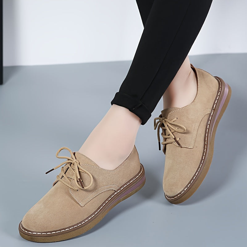 Women's flat, lace-up loafers in solid color, perfect for back to school with a comfortable preppy style.