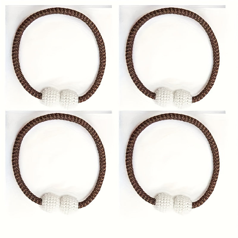 Enhance your home decor with this set of four magnetic curtain tiebacks featuring artificial pearl ball decoration. Made from contemporary style polyester weave rope, these tiebacks are perfect for securing drapes in both the bedroom and living room.