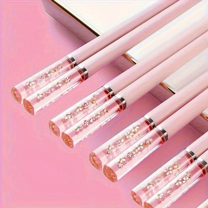 One set of Pink Cherry Flower Amber Chopsticks, ideal for Chinese and Korean style meals such as fast food, sushi, and ramen. Perfect for family meals and reusable kitchen supplies.