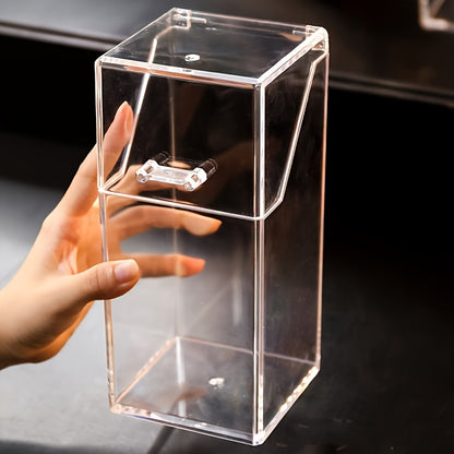 Clear acrylic desk organizer with lid for makeup brushes and pens. Transparent design for easy access and visibility. Made of clear acrylic material.