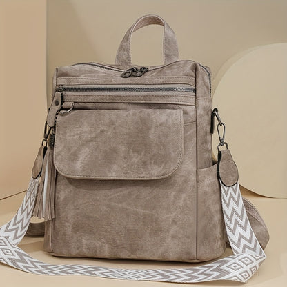 Retro brown women's fashion backpack with large capacity and versatile design, including multiple zippers. Can also be used as a crossbody or shoulder bag.