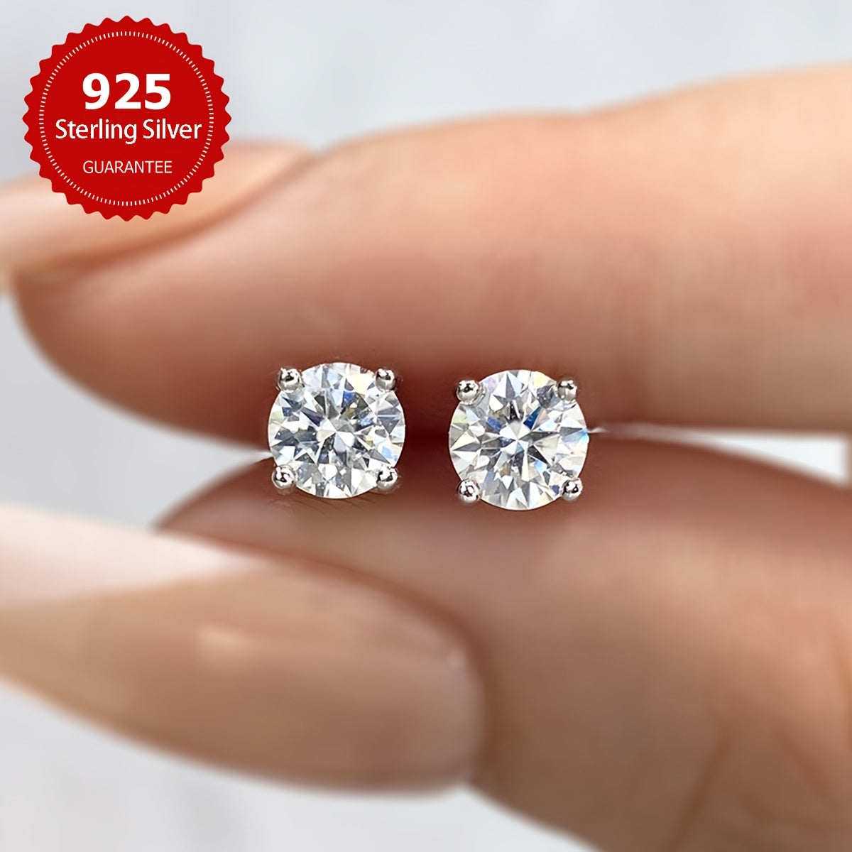 These elegant moissanite earrings come in a pair with a simple four-prong design weighing 1.2 grams for 0.5 carats, 1.7 grams for 1 carat, and 2.5 grams for 2 carats. Perfect for daily wear, these exquisite high-end ladies' jewelry pieces make a stunning