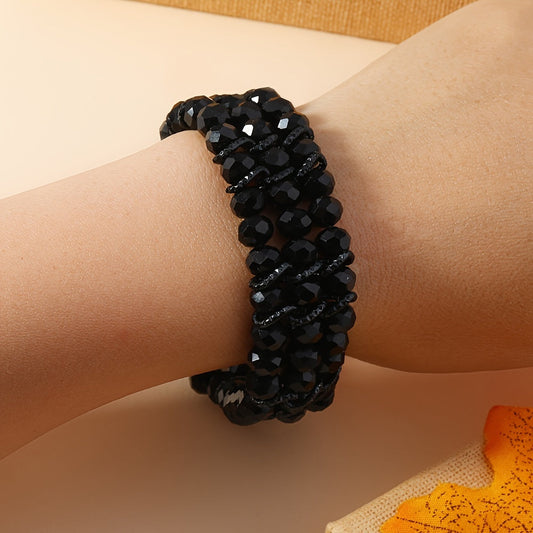 A versatile black beaded stretch bracelet in boho style for women made of aluminum alloy and artificial crystal, perfect for daily wear and gifting all year round.