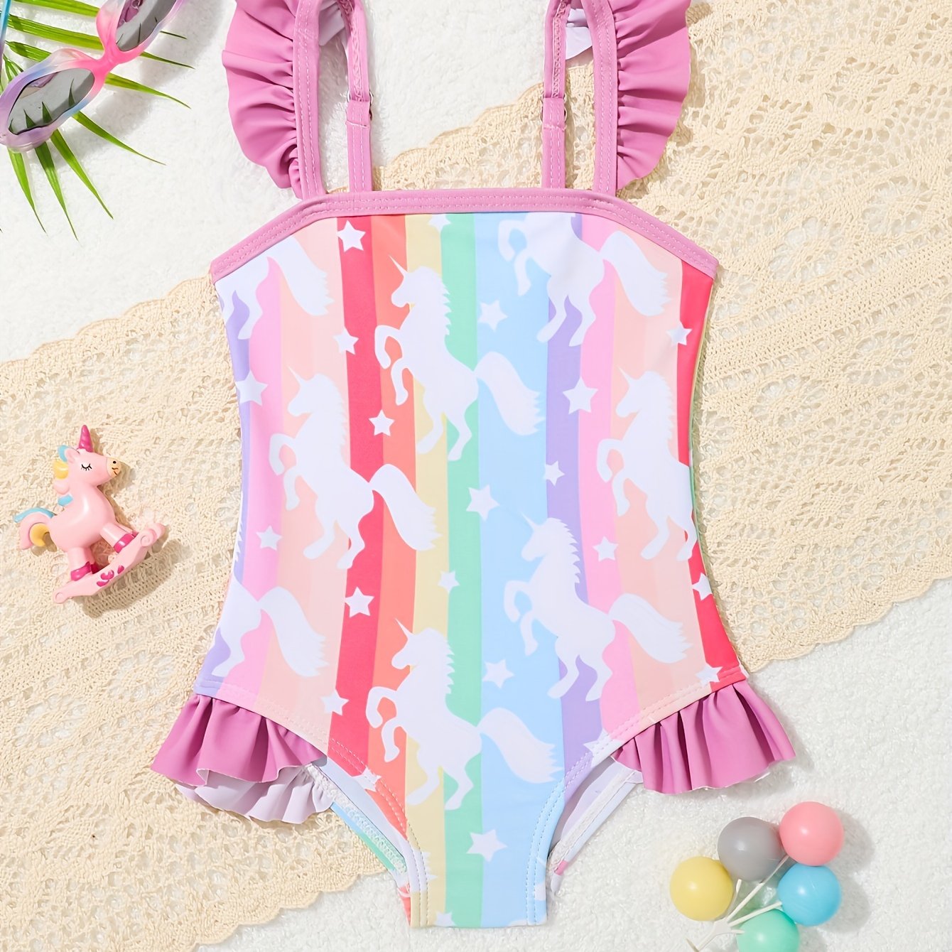 Adorable pineapple pattern one-piece girls' swimsuit in quick-dry, stretchy polyester with ruffle detail, off-shoulder design for toddlers.