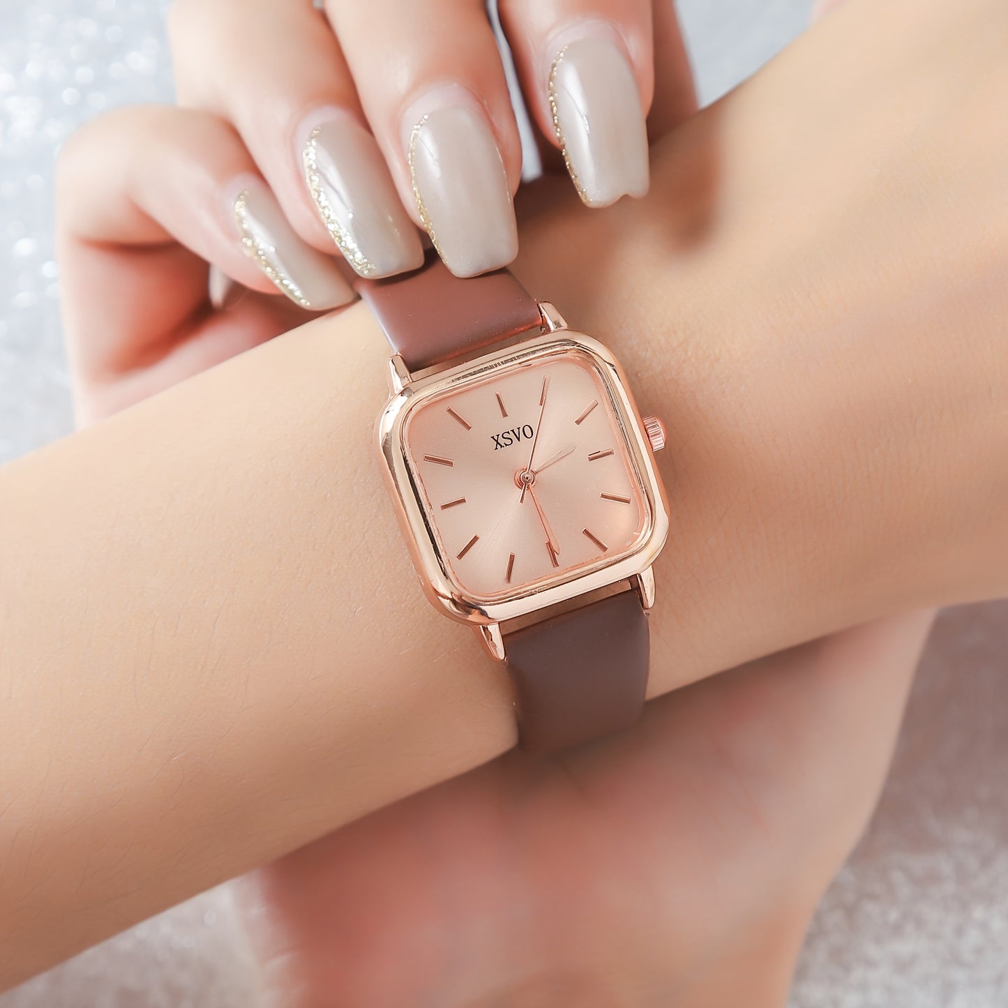 Women's casual square wrist watch with quartz movement, zinc alloy case, PU leather strap, electronic drive, and non-rechargeable button battery - a fashionable accessory for daily wear.