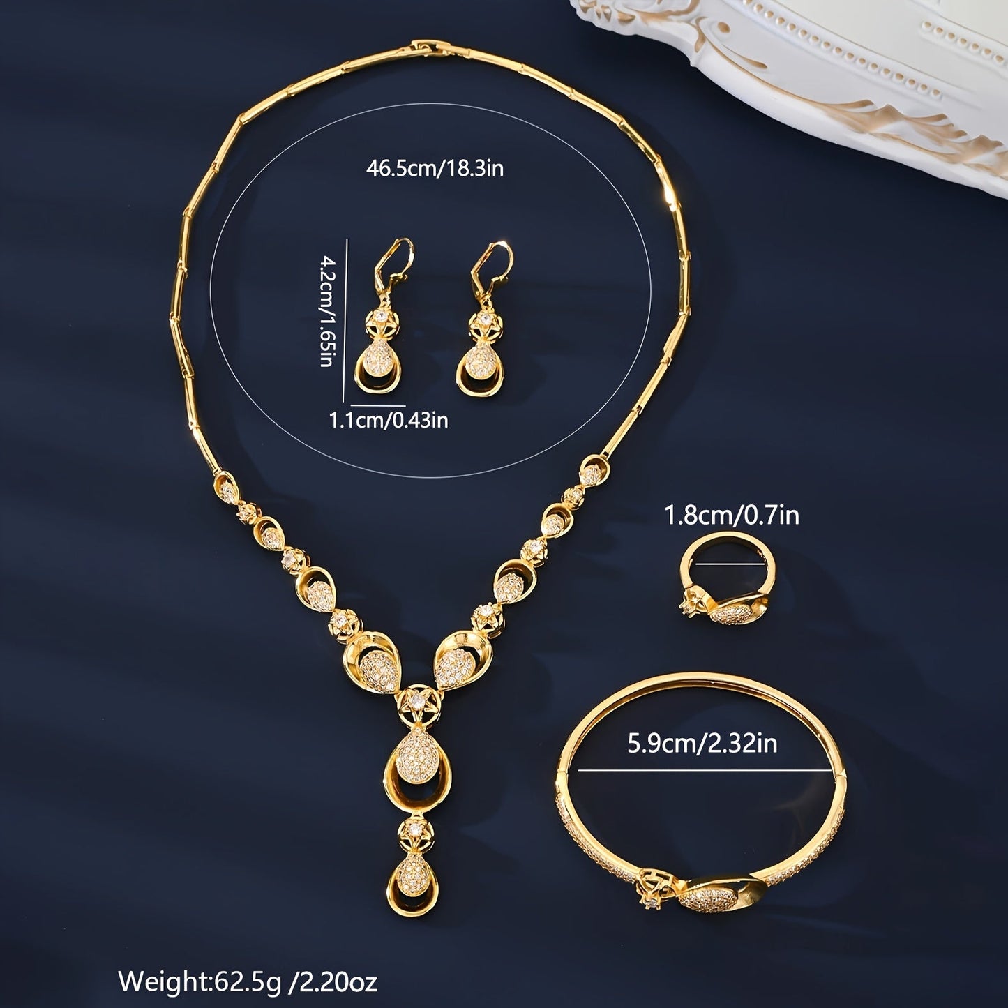 Exquisite 5-Piece Jewelry Set featuring 18K Gold Plating and Sparkling Zirconia Stones. This Set includes a Copper-Based Necklace, Earrings, Bracelet, and Ring perfect for Everyday Wear, Special Occasions, and as Gifts for Valentine's Day.