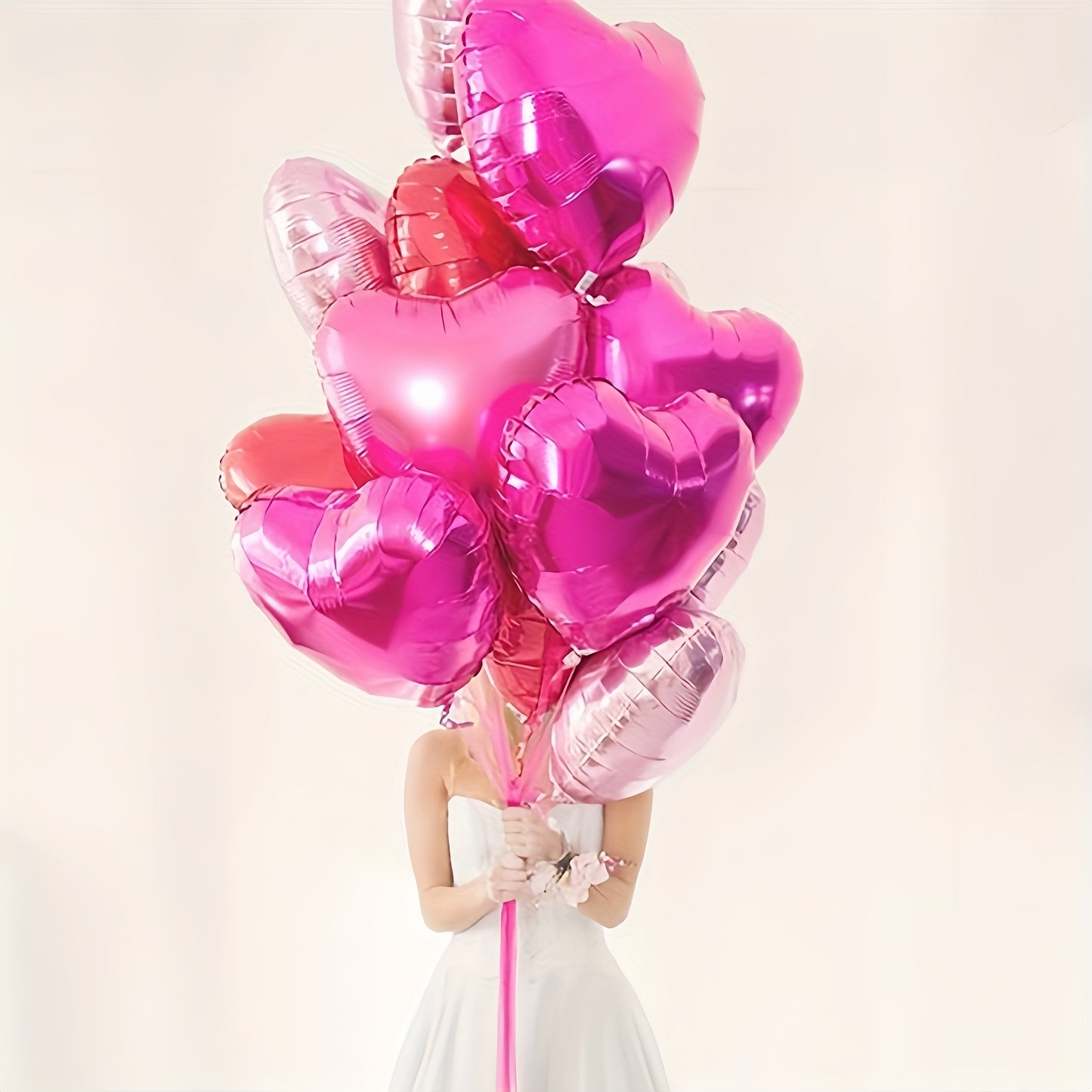 10 heart-shaped foil balloons for Valentine's Day, birthdays, weddings, anniversaries, themed events, engagements, and parties.