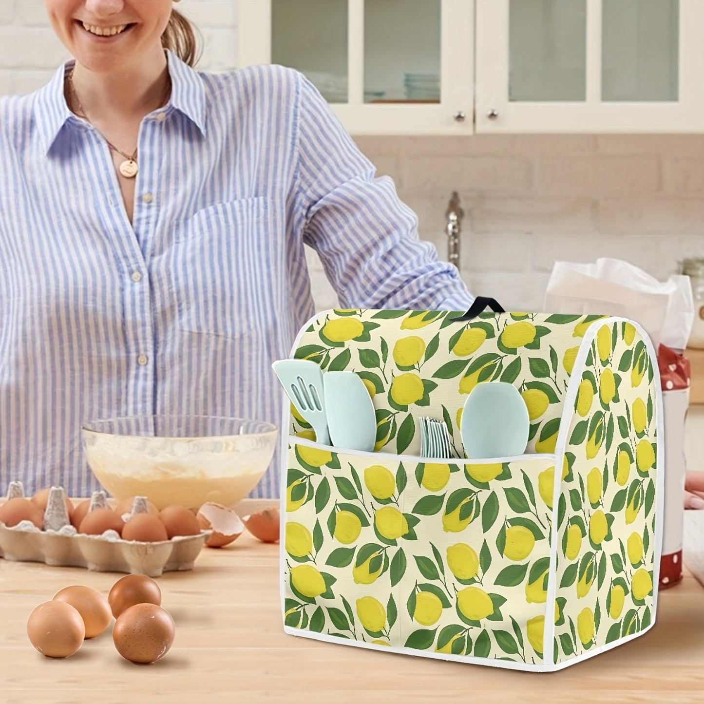 Protect your KitchenAid mixers and coffee makers with the stylish and easy-to-clean Rshubino Lemon-themed dust cover. This appliance protector features a convenient pocket and handle, and is safe for non-food contact.