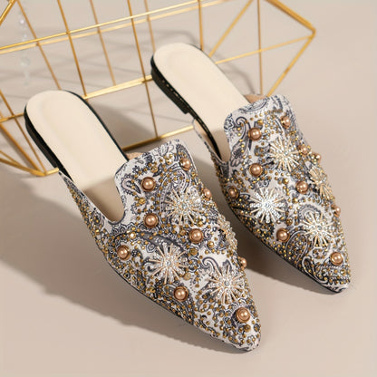 Stylish women's slide sandals with pointed toe, star pattern on flat sole, and easy slip-on design for casual and party wear.