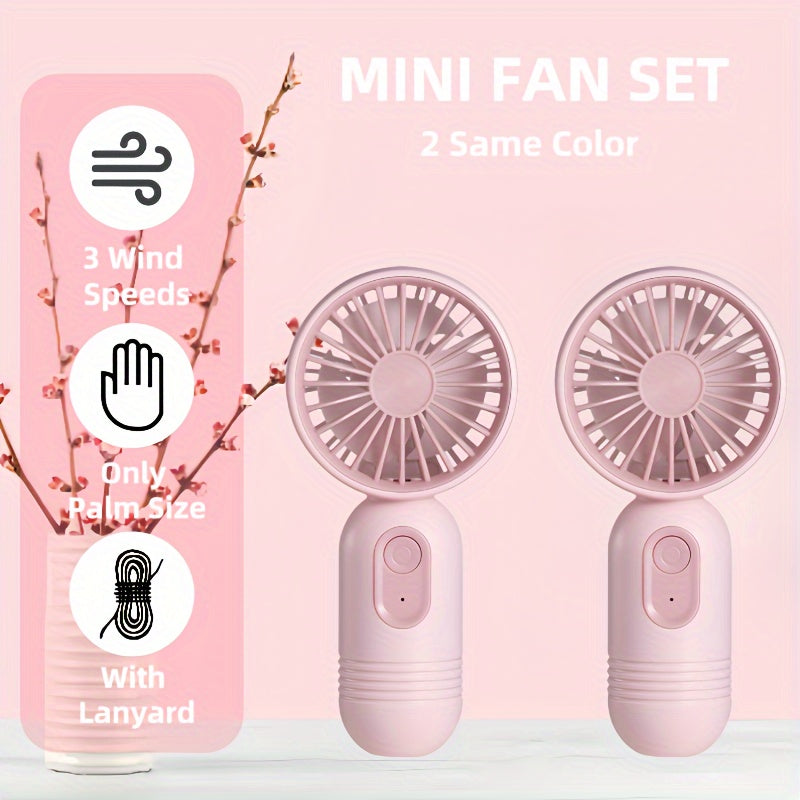 Stay cool in hot weather with this set of 2 Hanging Neck Fans with lanyards, perfect for office, outdoor activities, travel, and camping. These mini portable fans feature USB charging, 3 speeds, and are ideal for makeup touch-ups. A must-have for female