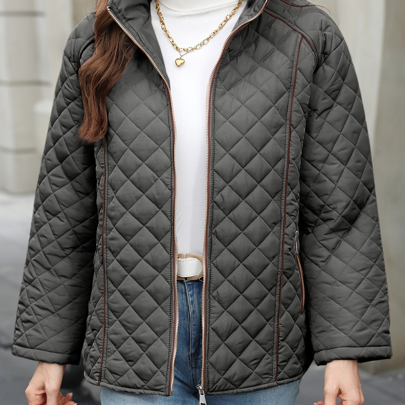 Women's plus size casual quilted outerwear with stand collar, zipper, and long sleeves. Made of 100% non-stretch solid woven polyester for fall/winter.