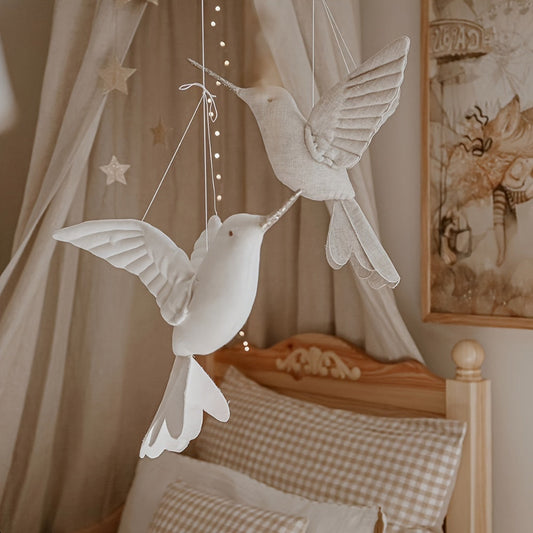 Nordic style pendant in the shape of a lovely linen art hummingbird, perfect for decorating a child's bedroom. Great for photography shoots and as a prop for kids' room decor.