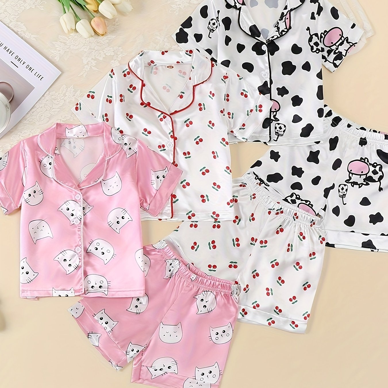 3-piece girl's ice silk clothing set features cute cow, rabbit, and leopard print. Comfortable and skin-friendly for daily wear.