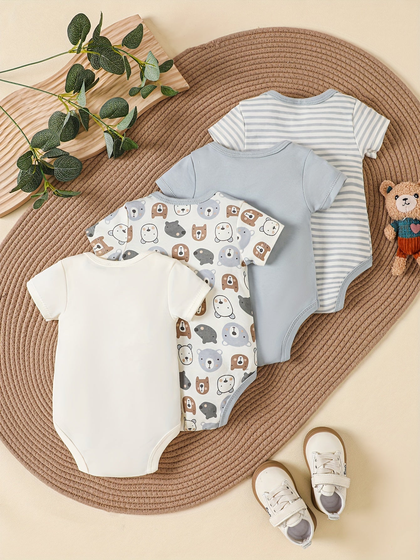 New four-piece set of triangle onesies for men and women, featuring bear cartoon pattern and creative solid color polka dot design. Made of pure cotton for comfort and softness, perfect for