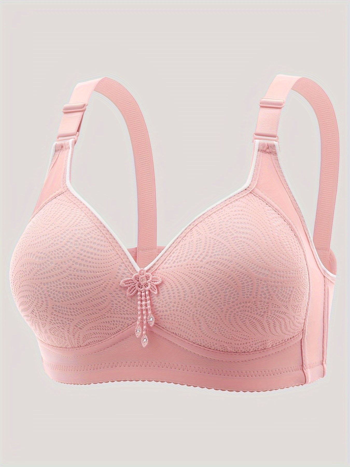 Printed, mature-style full-coverage bra with adjustable, wireless design and secure closure.