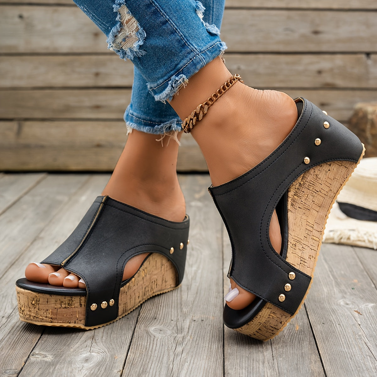 Women's stylish wedge sandals with metallic buckle straps in black, navy blue, and brownish-gold tones. Comfortable and fashionable.