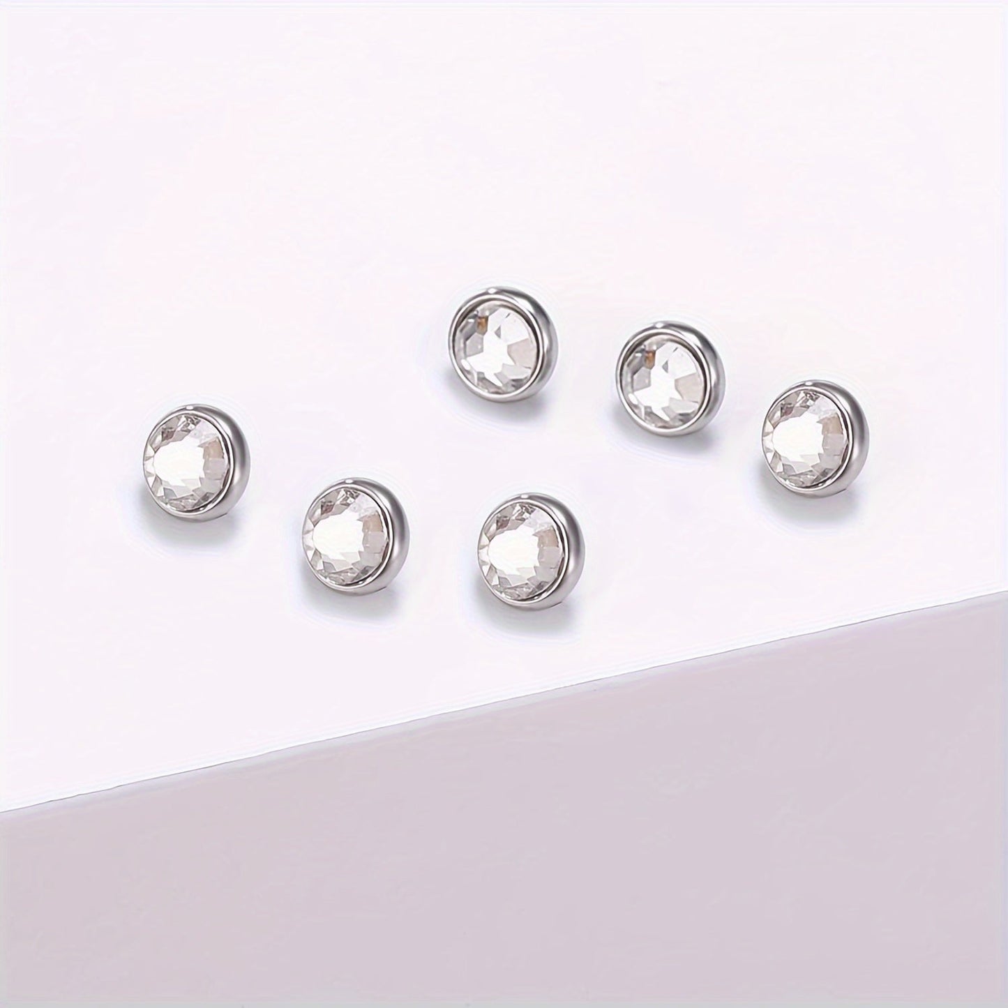 Set of 15 cubic zirconia dermal anchor tops and 4 stainless steel bases, perfect for both women and men. Made with 316L internally threaded 14G microdermals piercing jewelry, this set features a zircon mosaic design with no plating. Ideal for daily wear