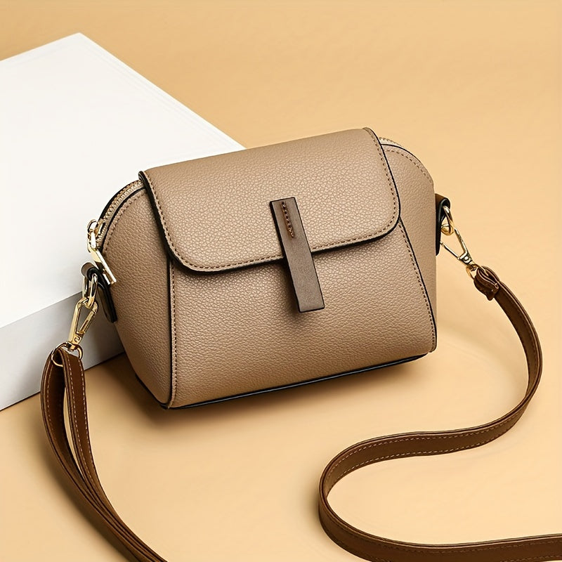 Stylish women's crossbody bag made of PU leather for daily use, measuring 7.1 x 5.1 x 3.5 inches.