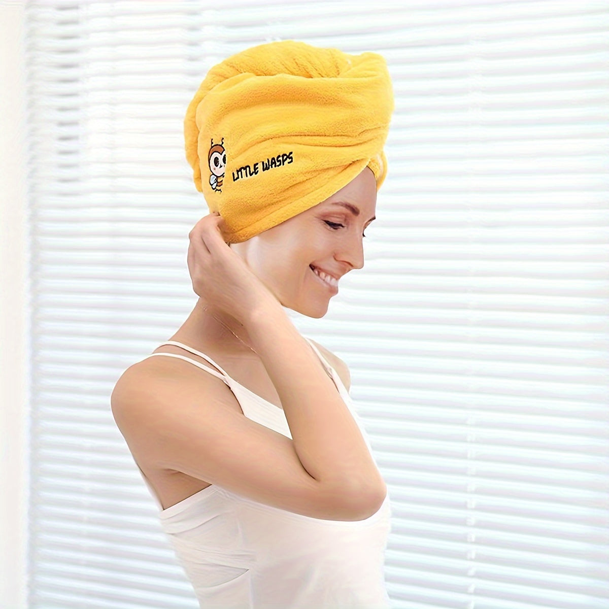 Ultra-absorbent microfiber hair towel wrap in cute cartoon designs - quick dry, lightweight shower cap for women. Available in blue, purple, yellow, pink. Soft and comfortable polyester blend.