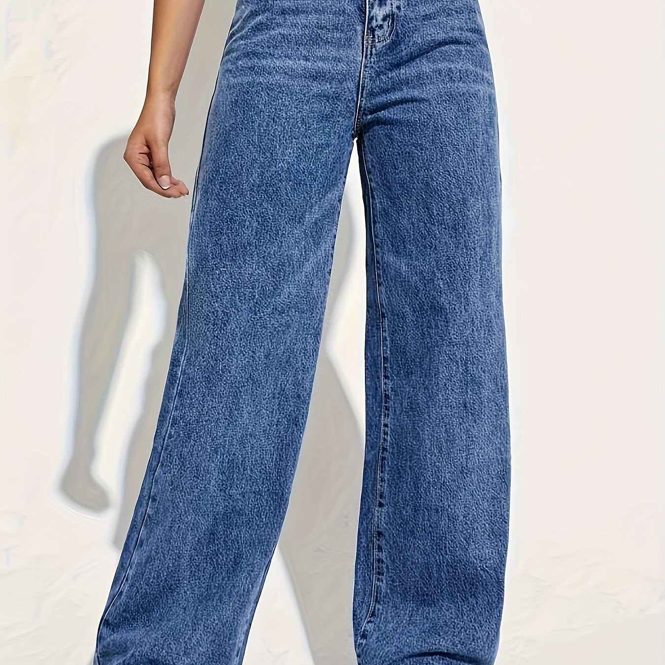 Women's high rise denim jeans with button fly and straight leg.