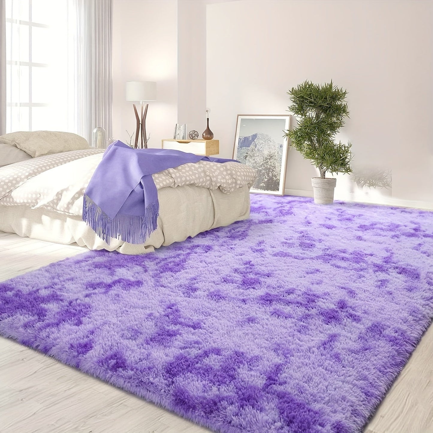 Luxurious Shag Area Rug: This modern plush fuzzy rug is perfect for adding comfort and style to any room. It is machine washable and non-shedding, making it ideal for use in the bedroom or as a bedside rug. The non-slip shaggy design is perfect for