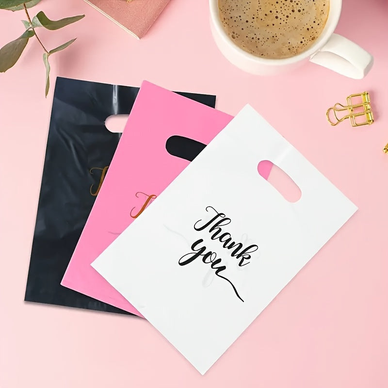 Stylish reusable plastic tote bags, ideal for retail, boutique, gifts, clothing & party favors, with elegant thank you text in black, white, and pink with golden cursive.