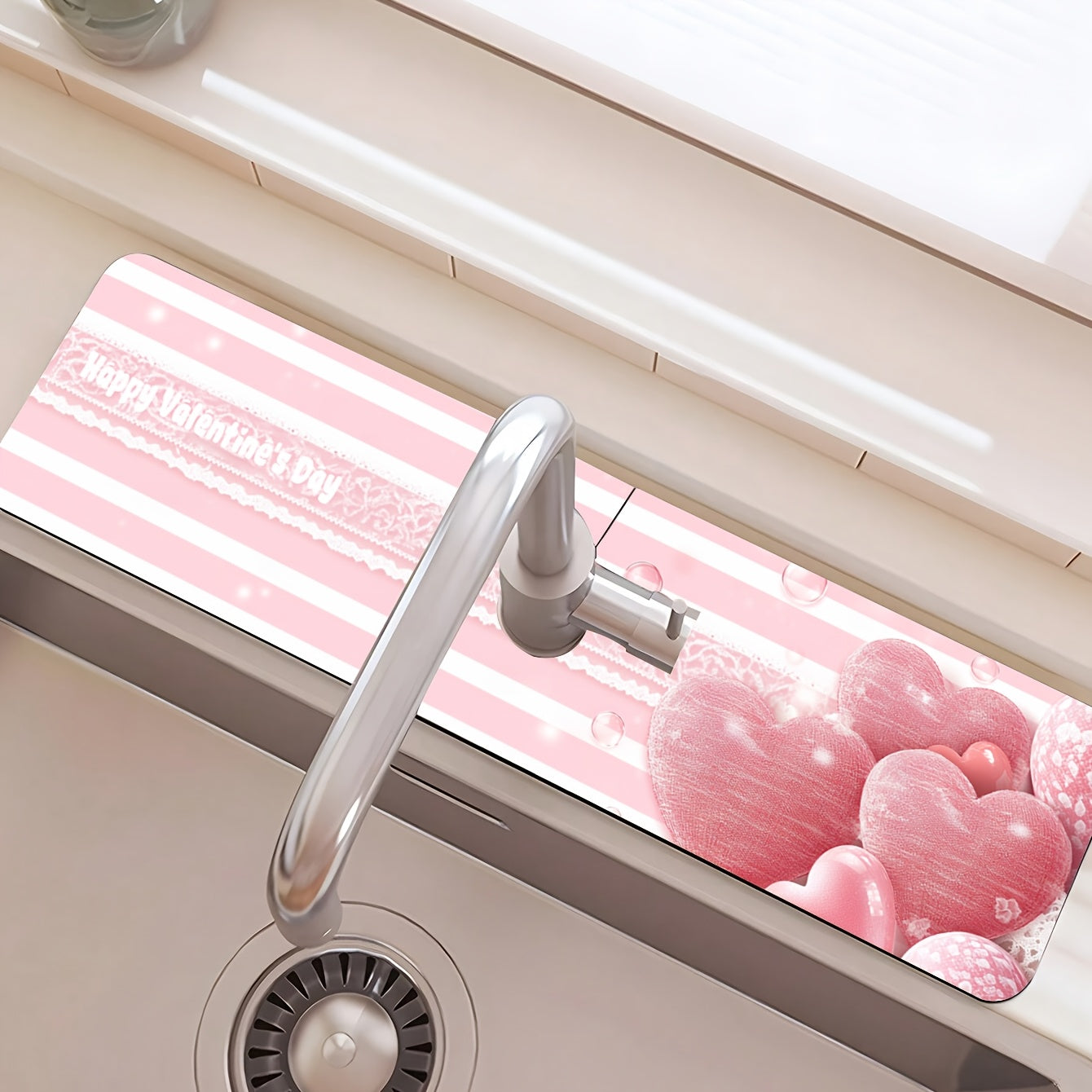 Pink Striped Love Faucet Mat - Perfect for Valentine's Day! Made from durable polyester, this moisture-proof and absorbent drain pad is ideal for use in the kitchen or bathroom. Features a diatom mud suction cup design for extra grip.