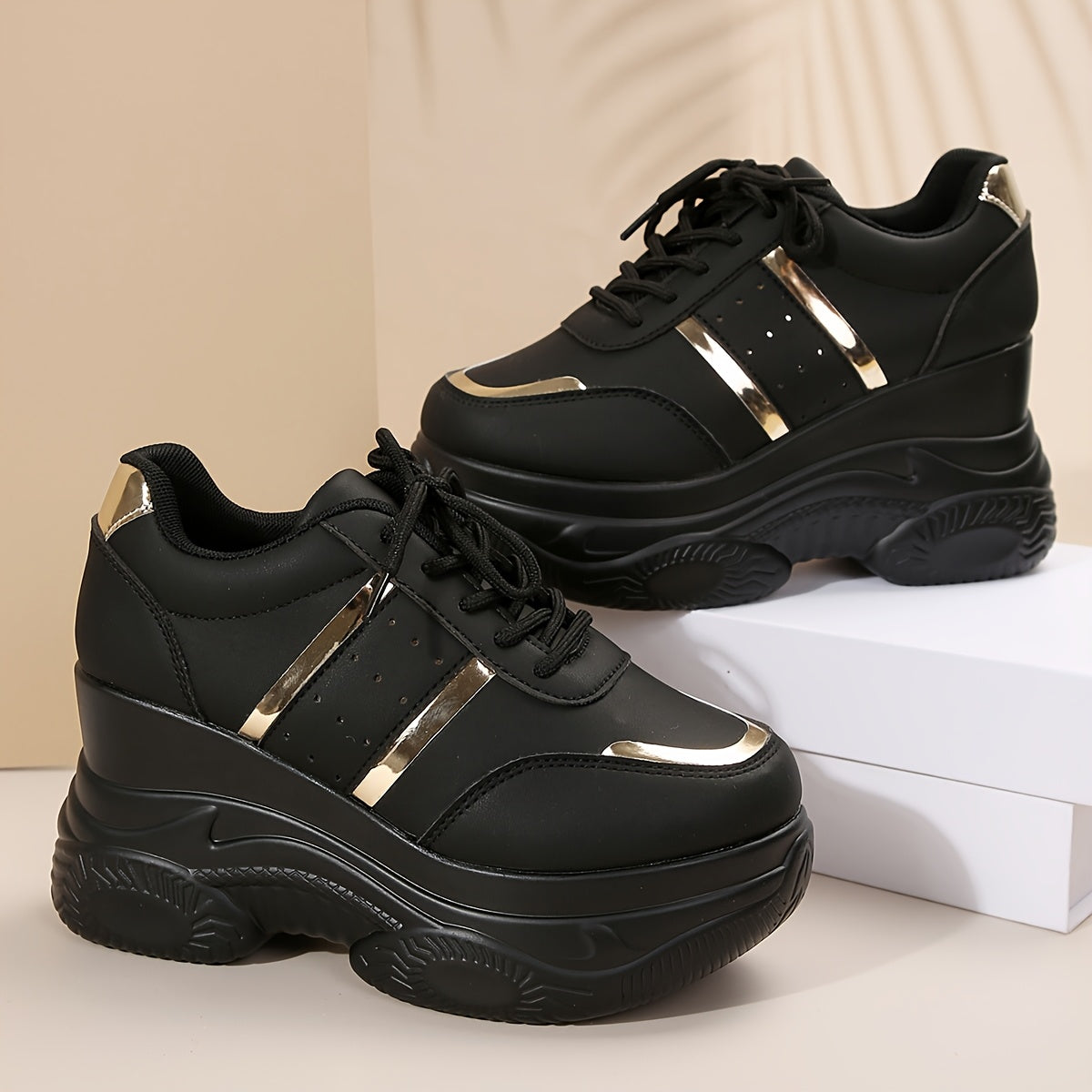 Gold-trimmed lace-up height-increasing casual sports shoes for women.