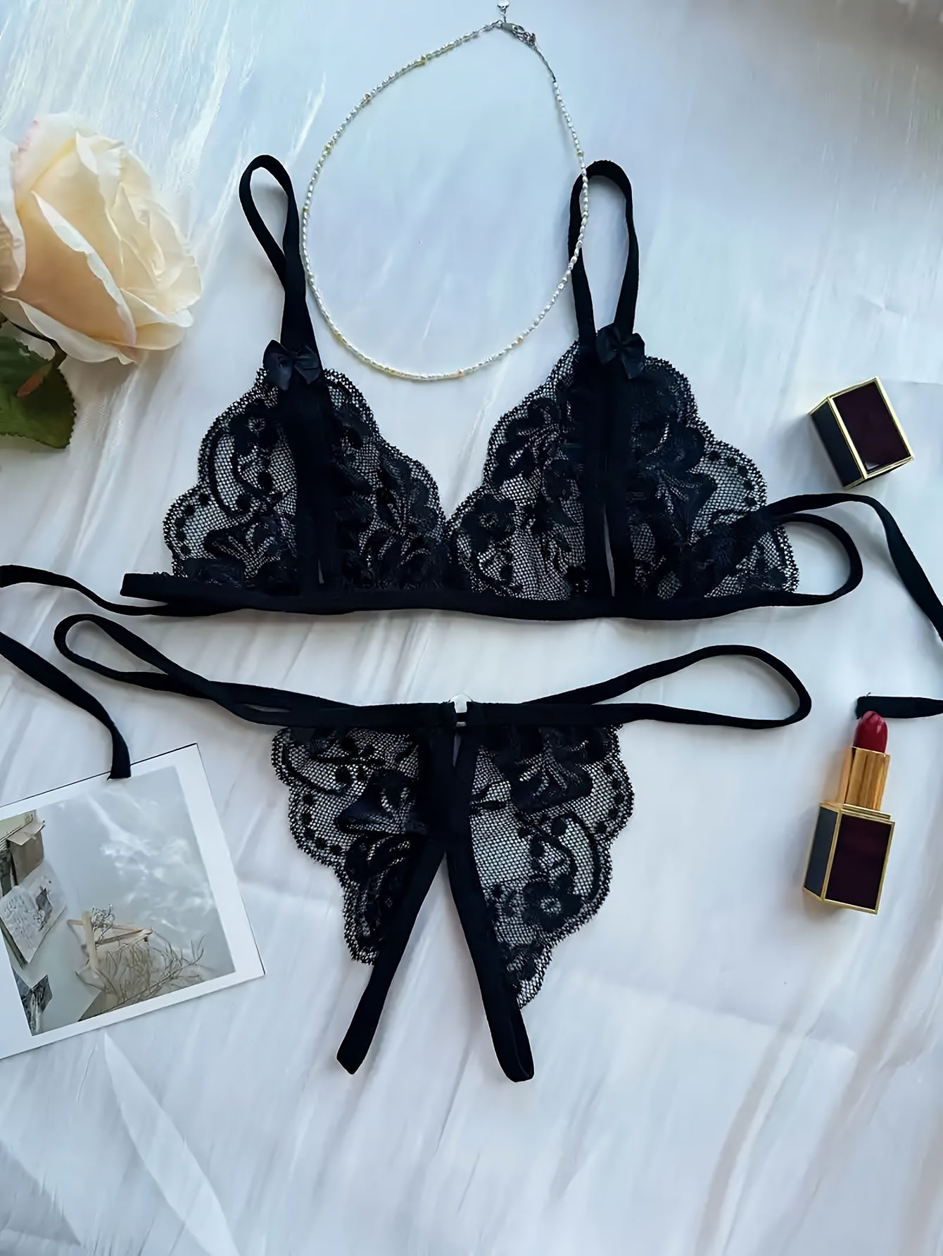 Women's Sexy Deep V-Neck Hollow Out Lingerie Set with Bra and Thong.