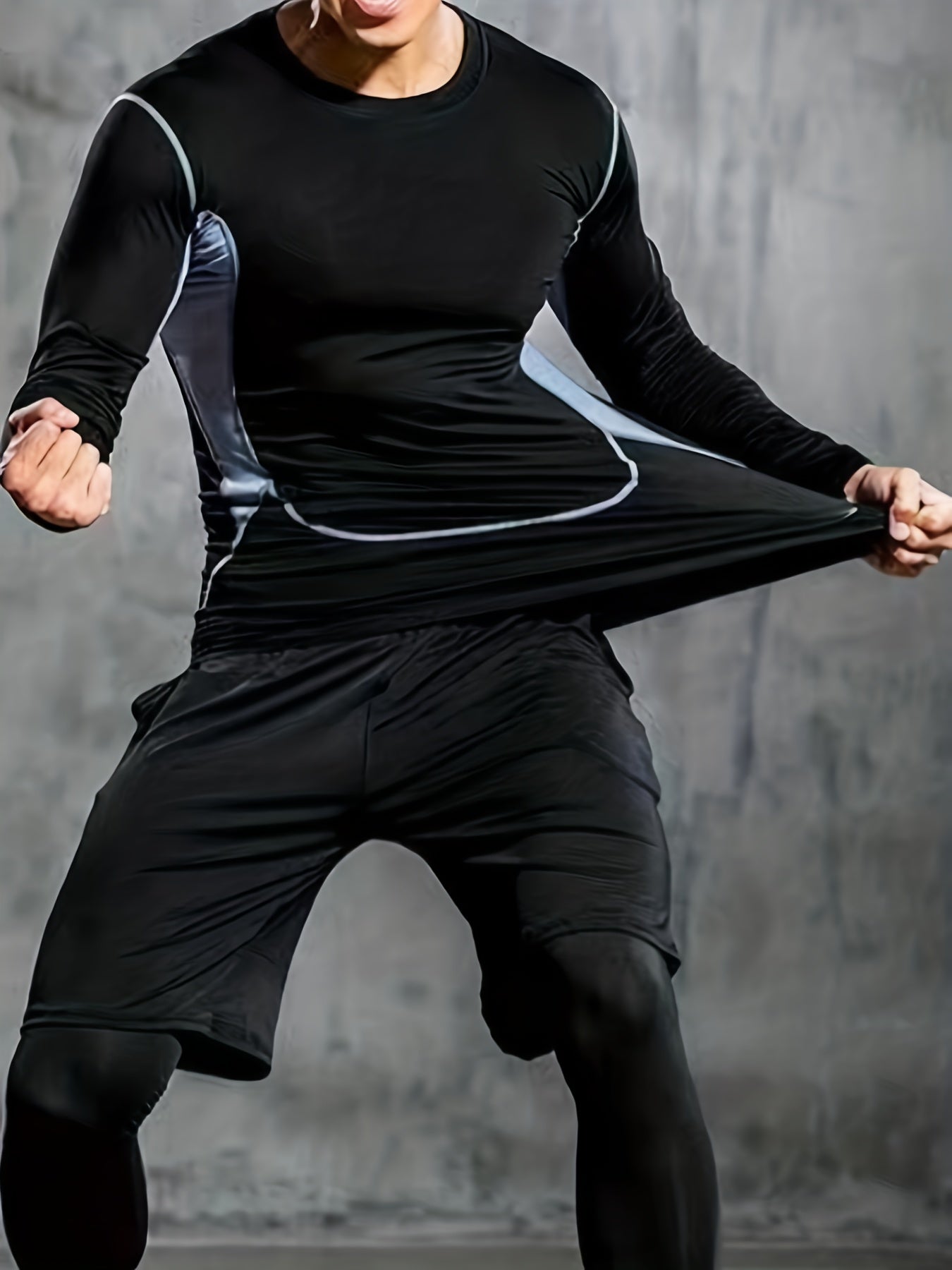 Men's tight sportswear set for gym workouts and running, featuring breathable long sleeve shirts and indoor workout pants.