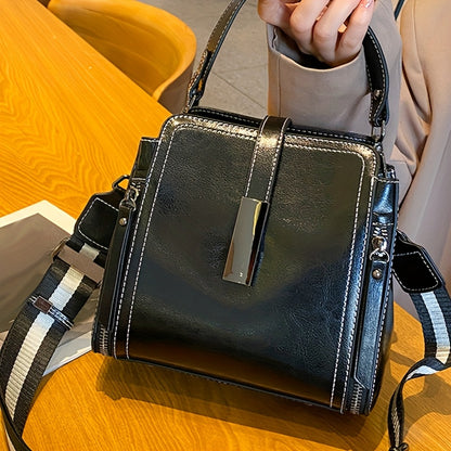 Stylish leather shoulder bag for women with removable strap, zipper closure, and edge paint detail. Available in black, coffee, and light brown.